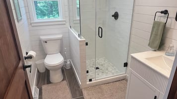 Shower, towels, soap, shampoo