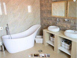 Douche, bidet, serviettes fournies, savon