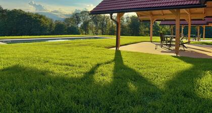 Cozy Wooden Chalet with Heated Pool – Scenic Green Views in Styria