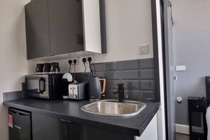 Microwave, stovetop, coffee/tea maker, toaster