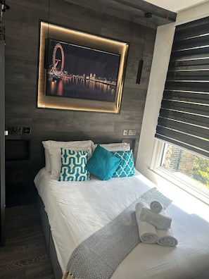 1 chambre, fer et planche à repasser, Wi-Fi, draps fournis