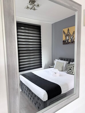 1 غرفة نوم ومكواة/لوح كي وواي فاي وملاءات أسرّة