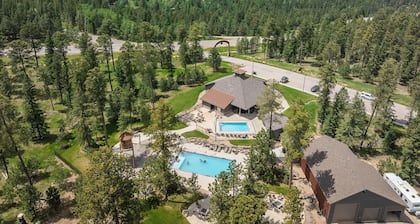 Magnificent 5 bedroom with Theater Room, AC, Hot Tub and Paved Roads