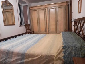 1 bedroom, desk, iron/ironing board, travel cot