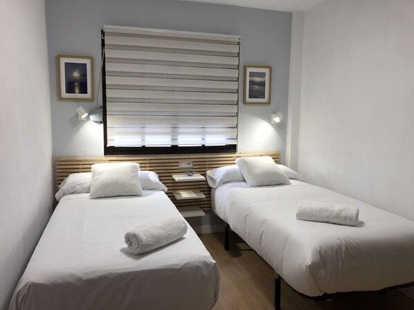 2 slaapkamers, een strijkplank/strijkijzer, gratis wifi, beddengoed