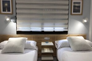 2 dormitorios, tabla de planchar con plancha, wifi gratis y ropa de cama