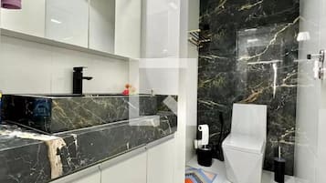 Hair dryer, towels, soap, toilet paper