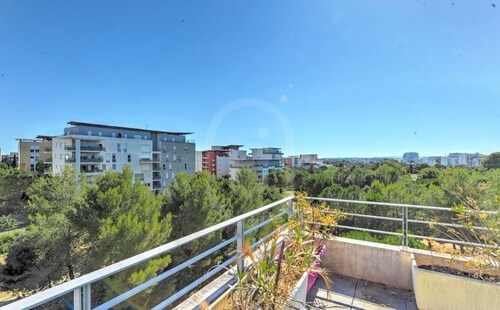 Appartement toit terrasse 120m2 Duplex idéalement situé proche centre et Plages