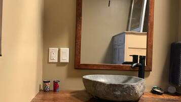 Shower, eco-friendly toiletries, towels, soap