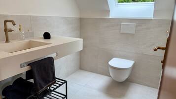 Hair dryer, towels, soap, toilet paper