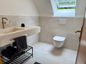 Hair dryer, towels, soap, toilet paper