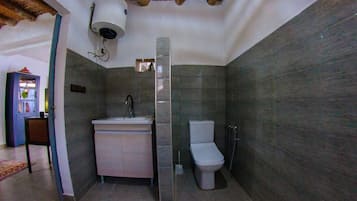 Shower, towels, soap, toilet paper