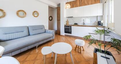 Sunny Balcony Stay | Walk to Golem Beach by PikHost