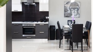 Coffee/tea maker, fridge, microwave, oven