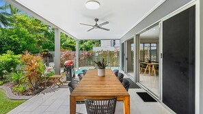 Outdoor dining - Sandveil | Absolute Beachfront Access Home with Pool, Ocean Views & Family Space (Trinity Beach)
