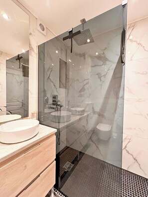 Shower, hair dryer, towels, soap