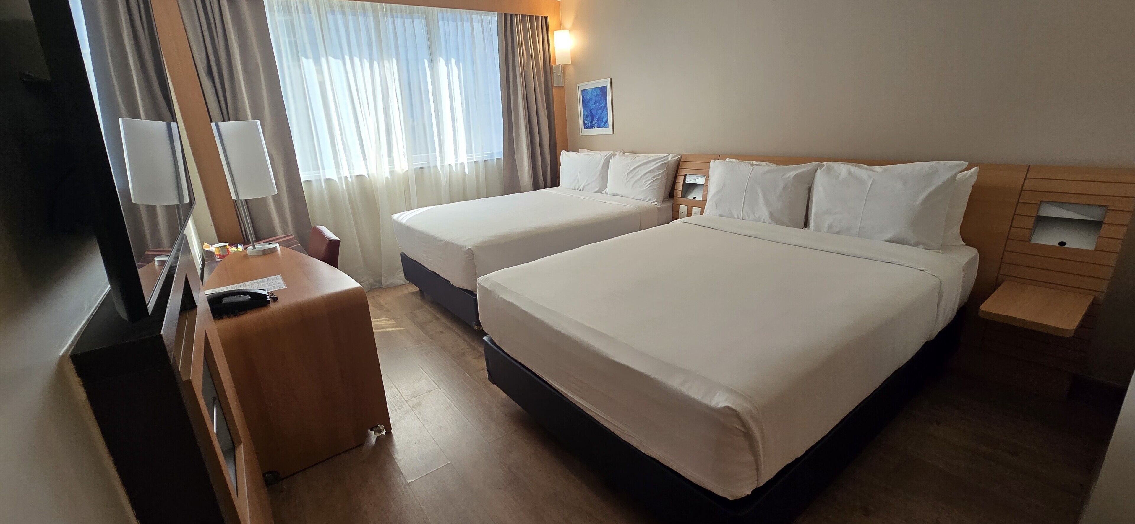 Family Quadruple Room, Sea View | Minibar, in-room safe, desk, laptop workspace