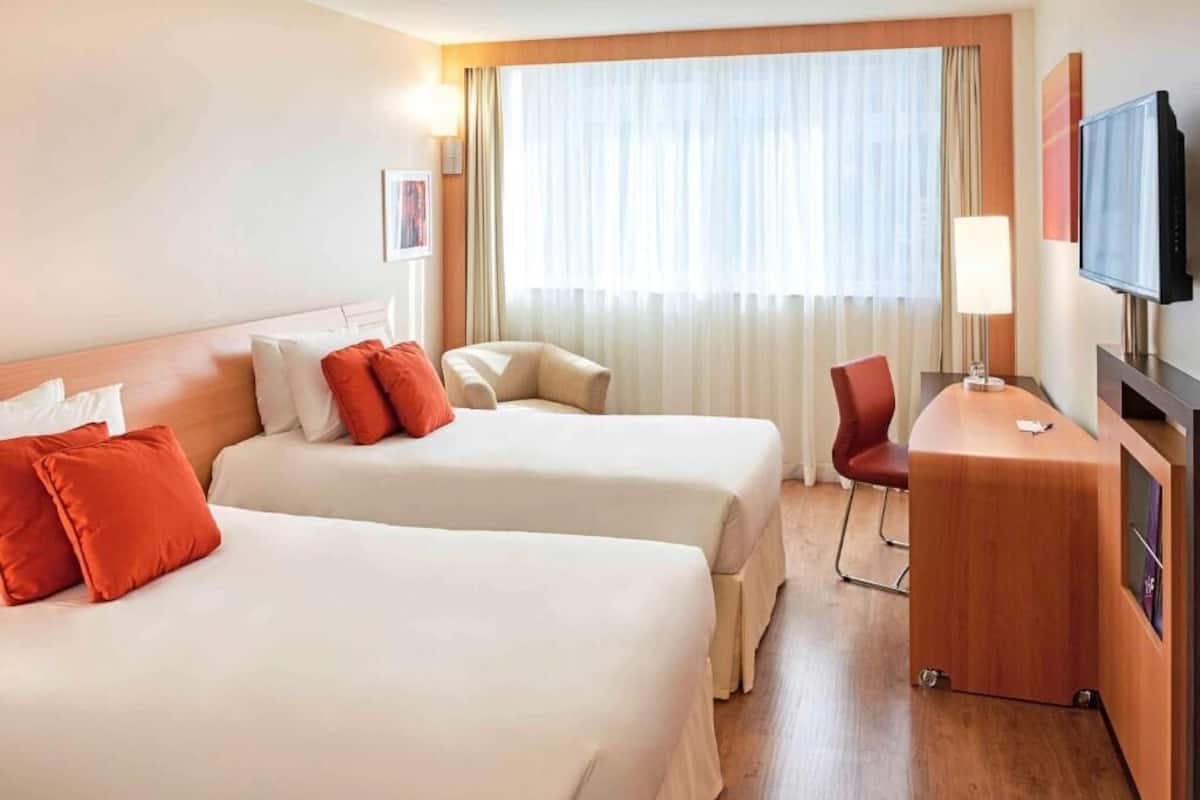 Superior Twin Room, 2 Single Beds, Partial Sea View | In-room safe, desk, laptop workspace, blackout curtains