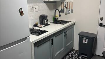 Microwave, stovetop, coffee/tea maker, toaster