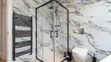 Shower, hair dryer, shampoo