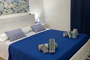 1 chambre, fer et planche à repasser, accès Internet, draps fournis