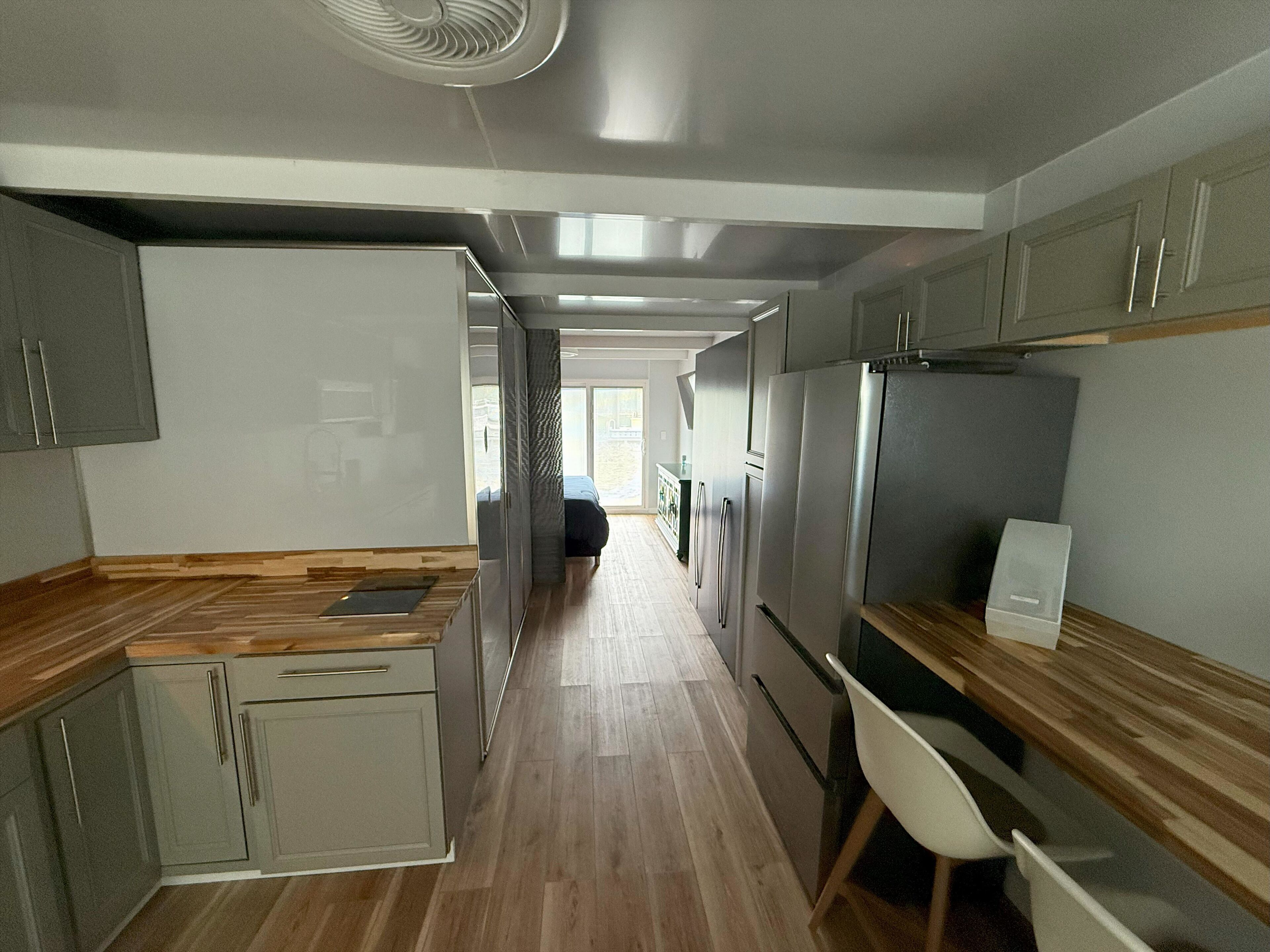 Fridge, microwave, stovetop, cookware/dishes/utensils