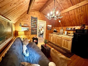 TV, fireplace - The Dapper Duck log cabin! Charming 1-bedroom in The Forest! (Cosby)