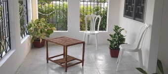 Relax & Recharge in Spanish Town – 2BR Oasis w/ Hot Tub, AC & Wi-Fi