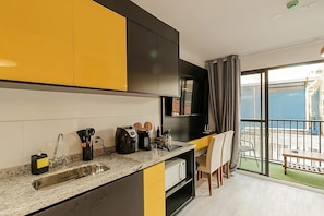 Luxury Double Room Single Use, 1 Double Bed, Air conditioning, Garden View | Private kitchen | Full-size fridge, microwave, oven, stovetop