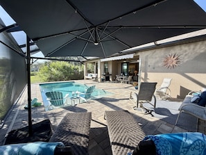 A heated pool - * Tropical Luxury Retreat with Private Pool and "Picture Perfect" Panoramic Views! * (Rotonda West)