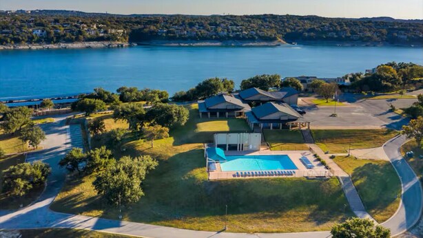 A large property with a swimming pool, multiple buildings, and a view of a lake. - Lake Travis Retreat! Kayaks/Boat Launch/Pool/Park/Point Venture/"Summit Ridge" (Lago Vista)