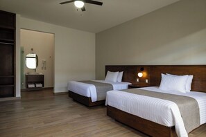 Deluxe Double Room, Courtyard View | Desk, laptop workspace, free WiFi - Aura Hotel (Uruapan)