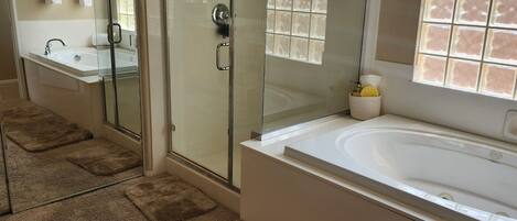 Jetted tub, hair dryer, towels, soap