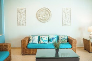 Junior Suite, Pool View | Living area