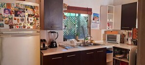 Maison Familiale, 3 chambres, 2 salles de bains, vue partielle sur l'océan | Cuisine privée