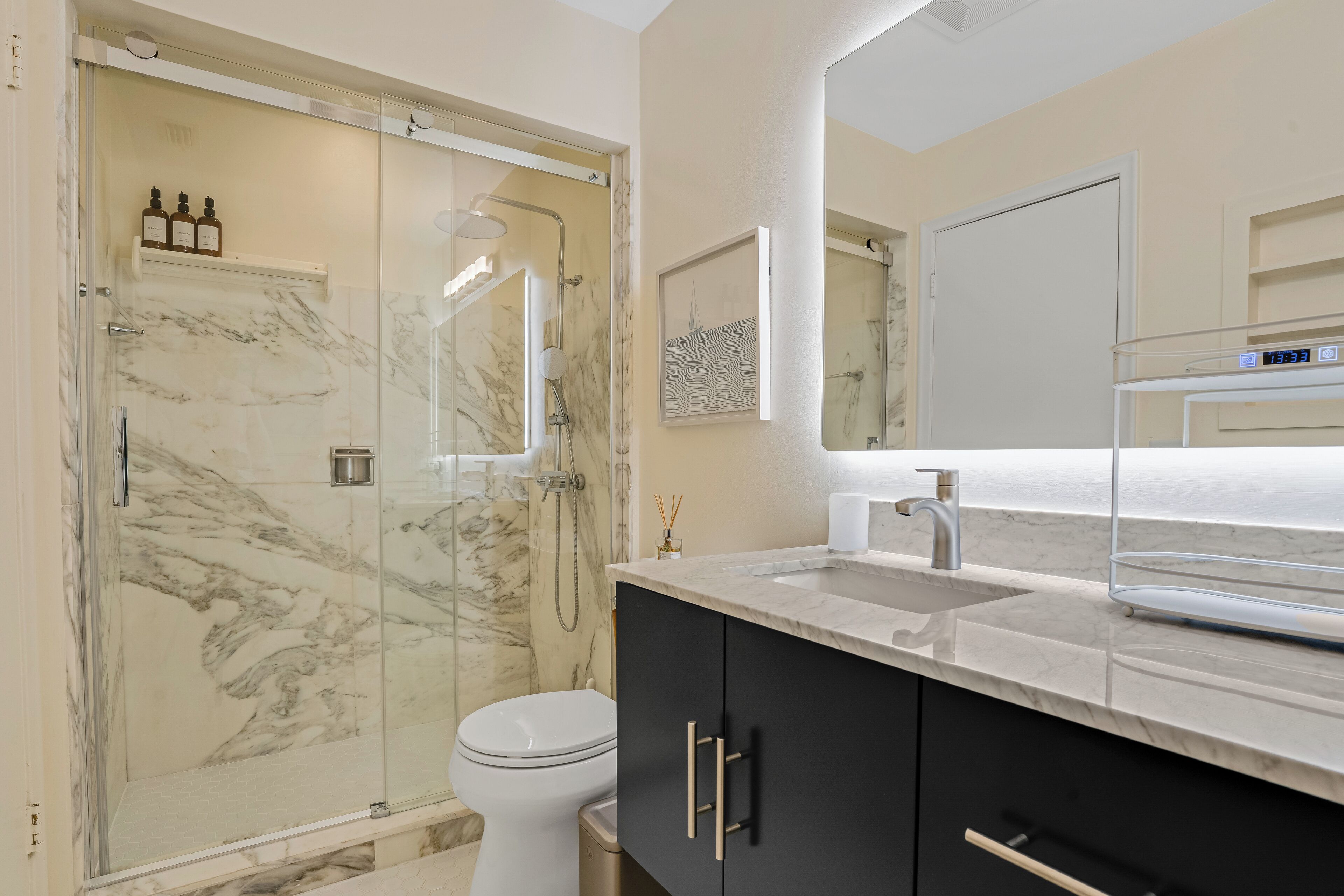 Shower, hair dryer, towels, soap