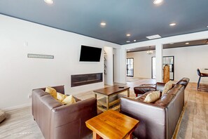 Smart TV, fireplace, foosball, table tennis - Hillside Hideaway ~ Dog-friendly home with wraparound deck, grill, game room, & bar - walk to dining (Big Bear Lake)