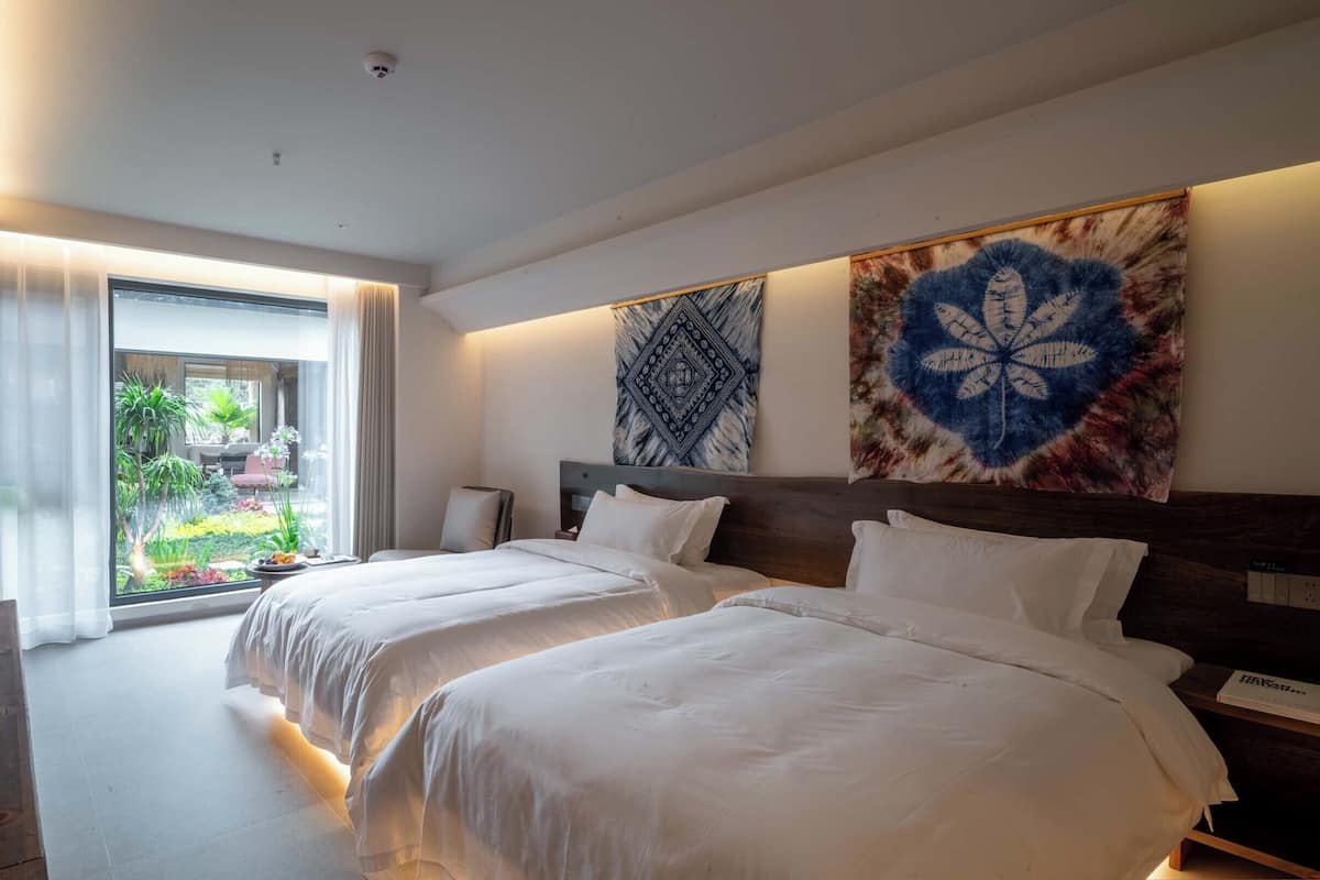 Design Twin Room | Premium bedding, down comforters, individually decorated