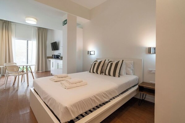 Iron/ironing board, travel crib, free WiFi, bed sheets