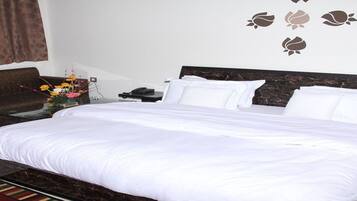 Deluxe Double Room, Courtyard View | In-room safe, desk, blackout curtains, iron/ironing board