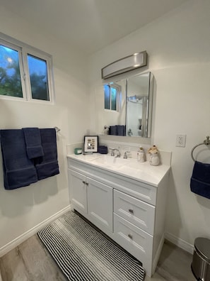 Hair dryer, towels, soap, toilet paper