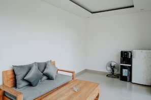 Deluxe Villa, Private Pool, Pool View | Living area | 43-inch LED TV with cable channels