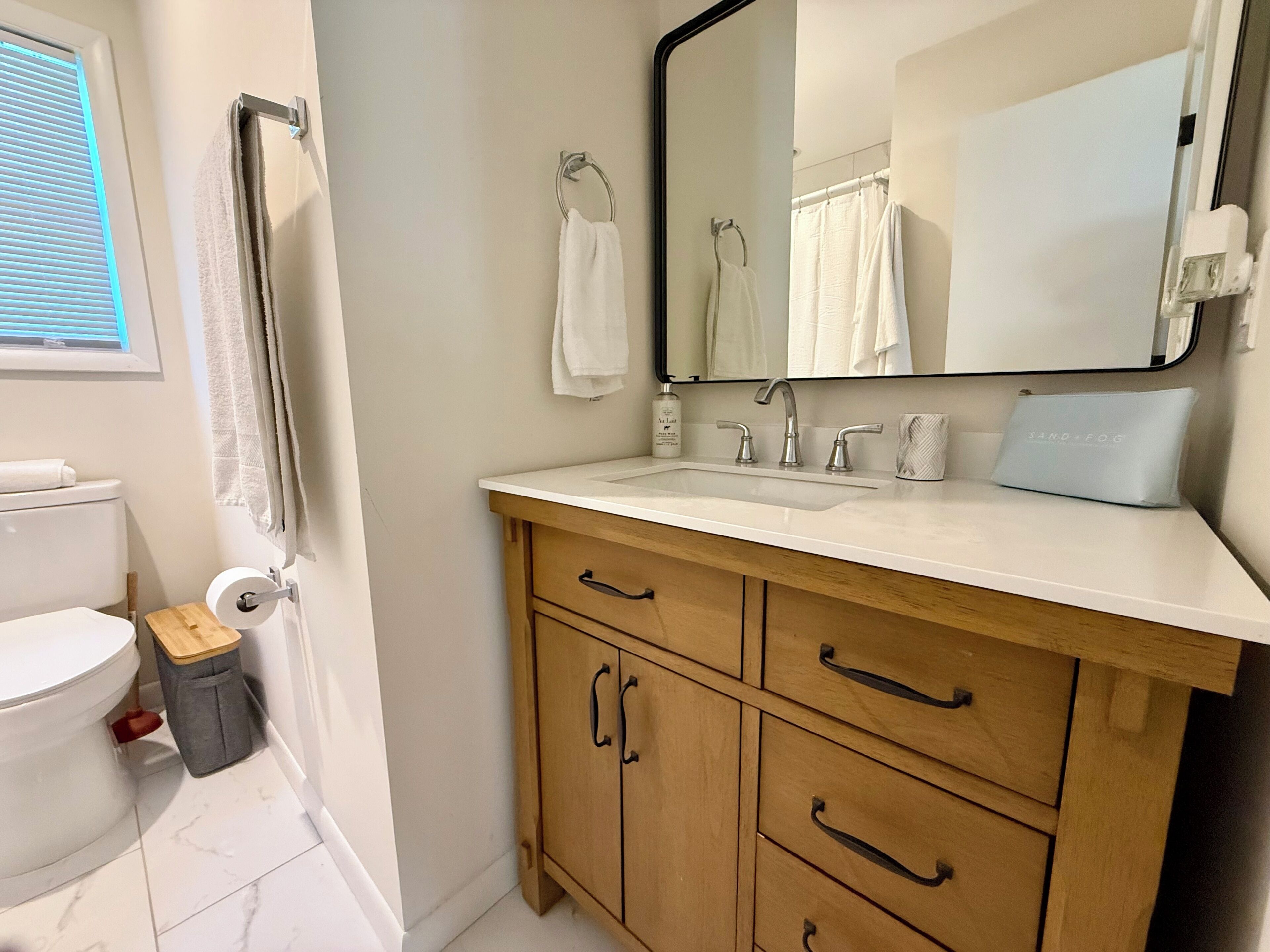 Hair dryer, towels, soap, toilet paper