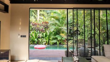 Villa Deluxe | Área de sala de estar | Televisión de pantalla plana