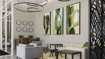 A modern living room with a sofa, armchairs, a coffee table, abstract paintings, a clock, and a decorative partition.