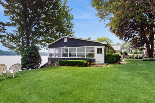Lakeside paradise w/ lakefront deck, enclosed porch, 2 docks & large lawn