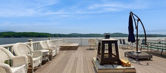 Lakeside paradise w/ lakefront deck, enclosed porch, 2 docks & large lawn