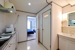 Fridge, microwave, cookware/dishes/utensils