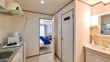 Fridge, microwave, cookware/dishes/utensils