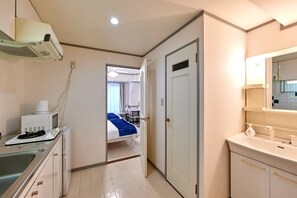 Fridge, microwave, cookware/dishes/utensils